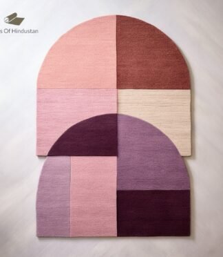 Arch-shaped area rug with geometric pink, maroon, and purple design, perfect for contemporary interiors.