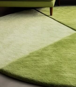 Luxurious round green gradient area rug with nature-inspired design, perfect for modern and minimalist interiors.