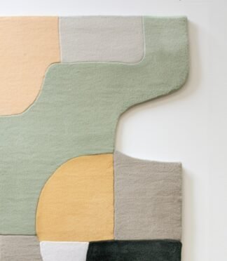 Modern geometric area rug with earthy tones and abstract patterns, perfect for stylish interiors.