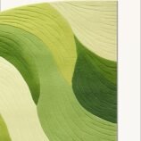 Modern green wave pattern area rug featuring vibrant shades of green, perfect for nature-inspired interiors.