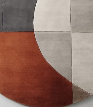 Modern geometric abstract rug with neutral beige, gray, and terracotta tones for contemporary interiors.