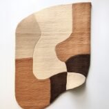 Earthy abstract rug featuring a blend of warm neutral tones in an organic pattern for contemporary interiors.