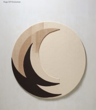 Circular crescent moon rug with a minimalist design in beige and black tones, perfect for modern decor.