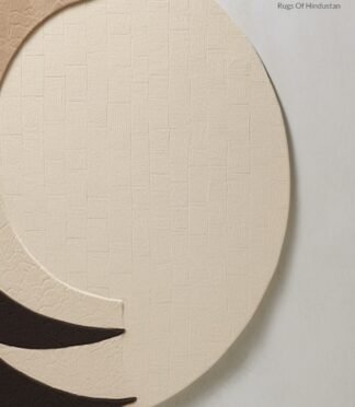 Circular crescent moon rug with a minimalist design in beige and black tones, perfect for modern decor.