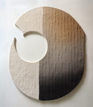 Modern gradient circular rug with beige-to-brown ombre design and unique asymmetrical cut.