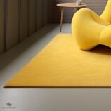 Minimalist yellow rug in a modern living room with a soft plush texture and contemporary design.