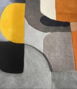 Abstract geometric runner rug in yellow, gray, and orange tones, ideal for kitchens and hallways.
