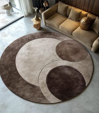 circular rug with geometric earth tones in mocha, taupe and beige by Rugs Of Hindustan
