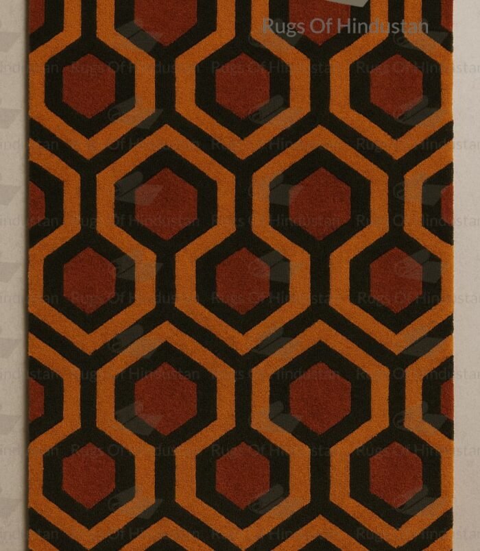 Handmade retro hexagon pattern wool rug with burnt orange and black geometric design