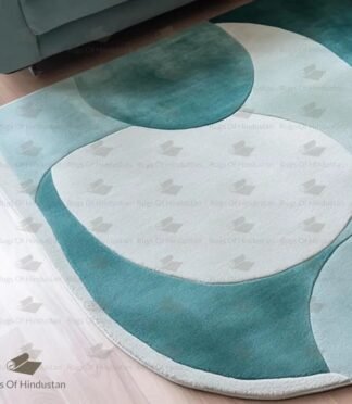 teal abstract wool rug with wave design in modern living room
