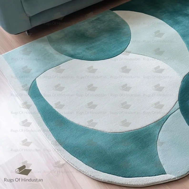 teal abstract wool rug with wave design in modern living room