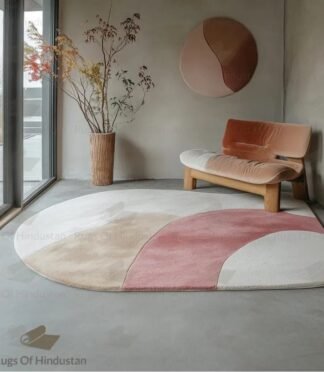 blush pink wool rug with abstract curved design in modern interior