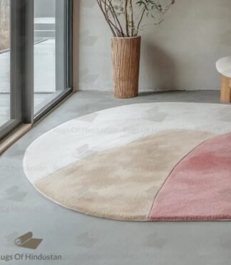 blush pink wool rug with abstract curved design in modern interior