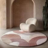 pastel abstract round wool rug in pink beige ivory handmade