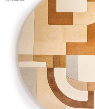 Modern artistic abstract area rug featuring a textured design with beige, gray, and black tones.