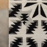 Handcrafted Southwestern black and white geometric wool rug with tribal pattern for elegant home décor.