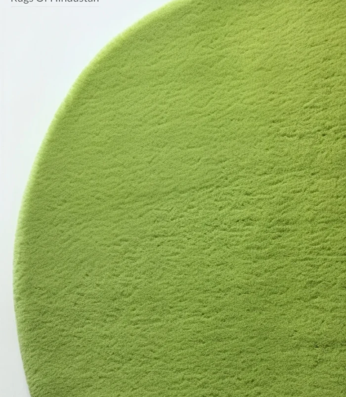 Modern green leaf-shaped rug with minimalist organic design, perfect for eco-friendly interiors.