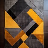 Modern geometric yellow and grey rug with bold abstract patterns for contemporary interiors.
