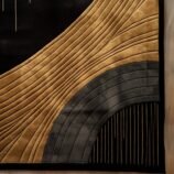 Modern black and gold abstract wool rug with an elegant and luxurious design for sophisticated interiors.