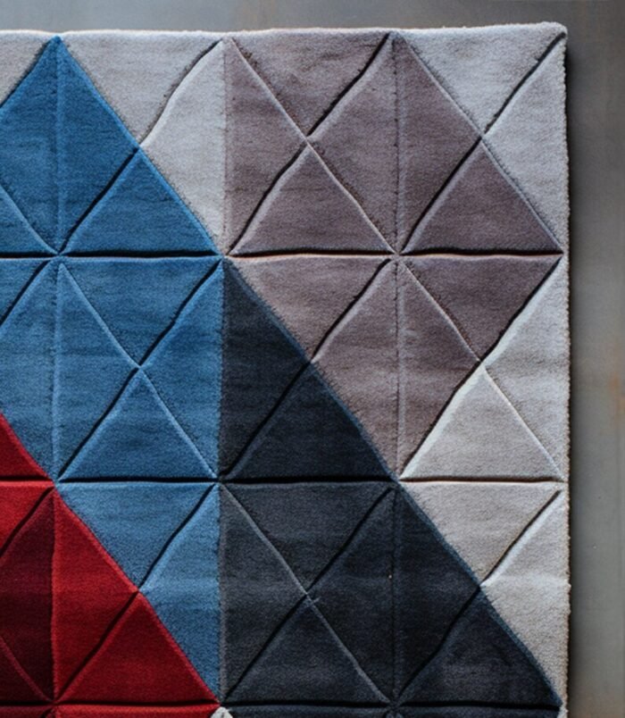 Handwoven Bohemian geometric wool rug with black and white pattern for stylish and cozy interiors.