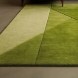 geometric green wool rug in modern living room